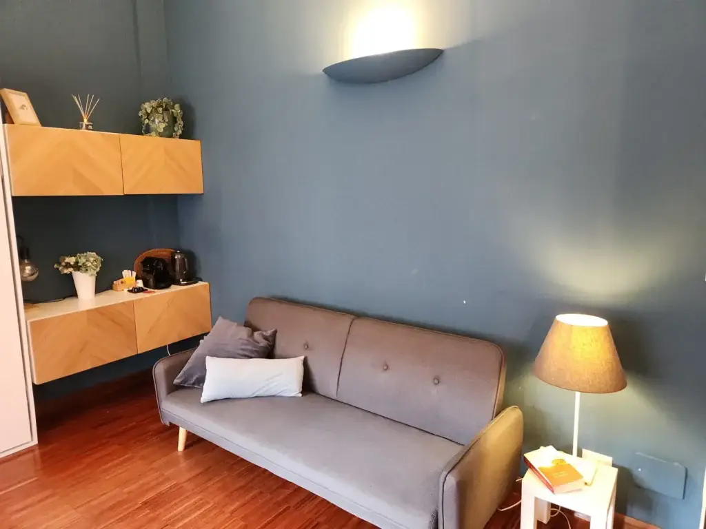 Blue Room 5 with blue accents and modern amenities