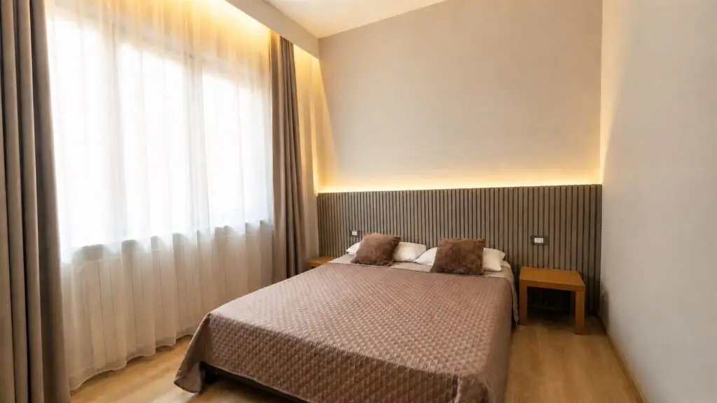 Letto matrimoniale della Room 2 di Gaia Suites Torino
