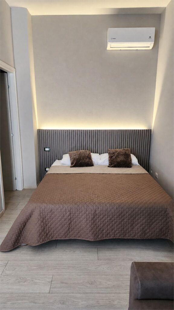 Lit double de la Room 4 chez Gaia Suites Turin
